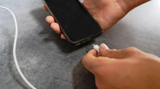 Picture of Why do phones still use battery when powered off?